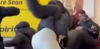 airport-brawl-passengers-fight-climb-over-seats-in-chaos